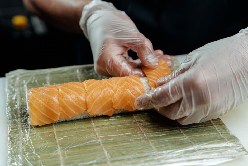 A sushi chef at the counter